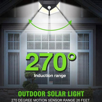 Stylish solar-powered security lamp enhancing a garden entrance.