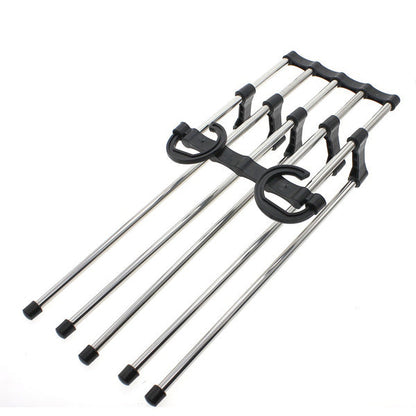 Multiple Organivo trouser hanger organizers stacked for maximum wardrobe organization.