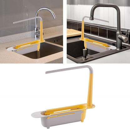 A telescopic sink organizer positioned under a running faucet, showcasing its drainage capability.