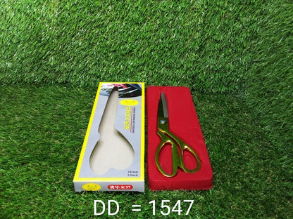 Full view of the golden tailoring scissor, showcasing its design and size.
