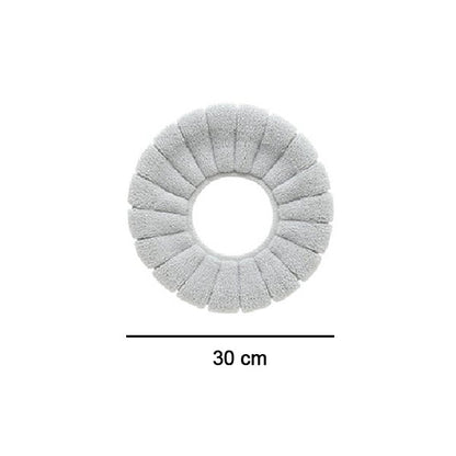 Texture of the soft coral velvet material, highlighting the luxurious feel of the Toilet Seat Cover.