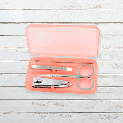AuriGlam portable nail clipper set in its clear plastic travel case.