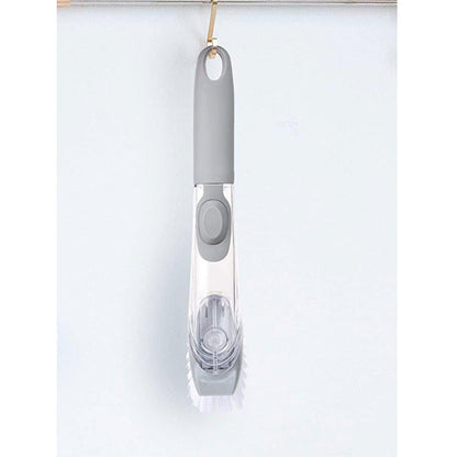 Close-up of the liquid dispensing dish cleaning brush bristles and scraper.