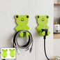 Plastic adhesive cable and socket holders set on white background