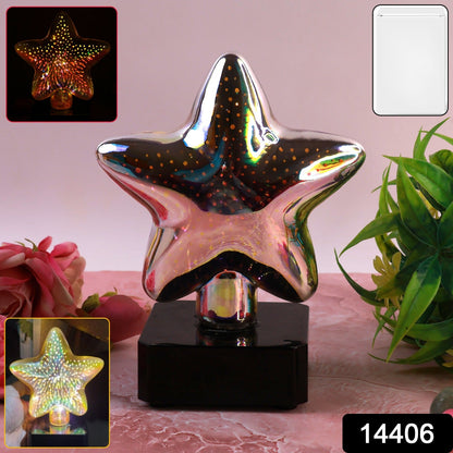 Close-up of star shaped decorative LED night lamp with rainbow LED dots