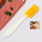 18 cm silicone cooking spatula on white background