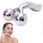 Ergonomic 3D roller face massager for gentle facial relaxation and skin contouring.