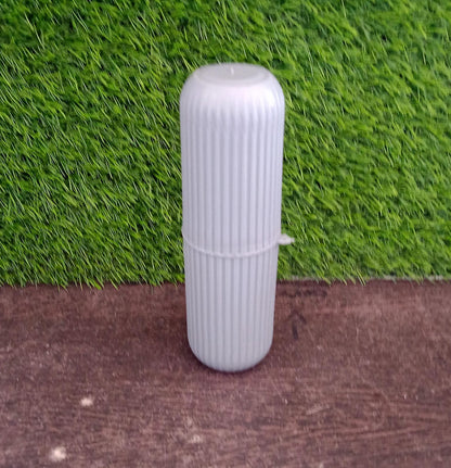 Textured capsule-shaped travel storage bottle from Organivo for secure grip.