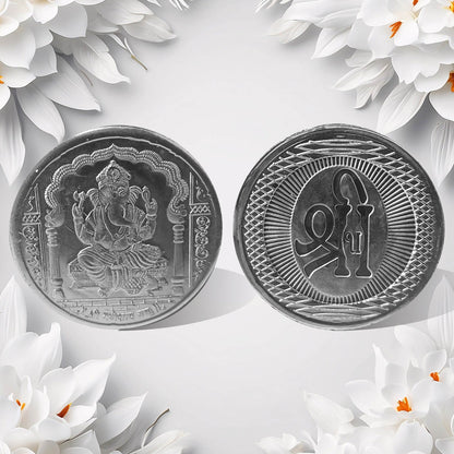 Hand holding the auspicious Decorative Ganesh Coin, ready for pooja or gifting.