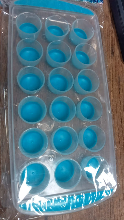 Smart push out round silicone mold for creating ice cubes or mini chocolates.