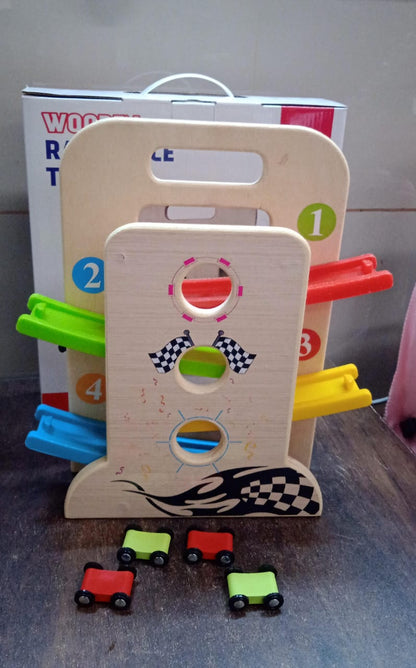 Portable Wooden Ramp Racer playset showing the convenient carry handle and cars.