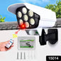 AutoSafeo solar security camera light, motion sensor, on an outdoor wall.