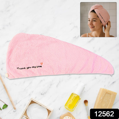 Lightweight microfiber towel wrap securing hair with button closure