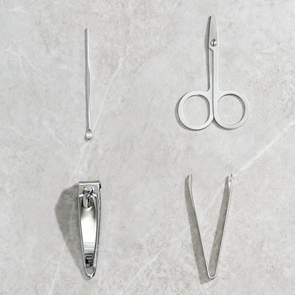 The AuriGlam 4-piece stainless steel nail clipper set displayed in its open case.