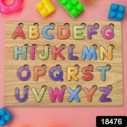 Toddler hands engaging with the vibrant wooden ABC and shape learning puzzle.