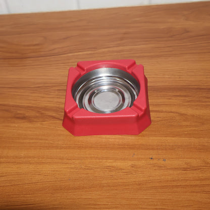 Heat-resistant ashtray in a home or office setting for ash disposal