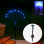 Solar LED fiber optic garden light illuminating a pathway at night