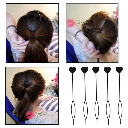 Pair of black heart-shaped hairpins placed side by side