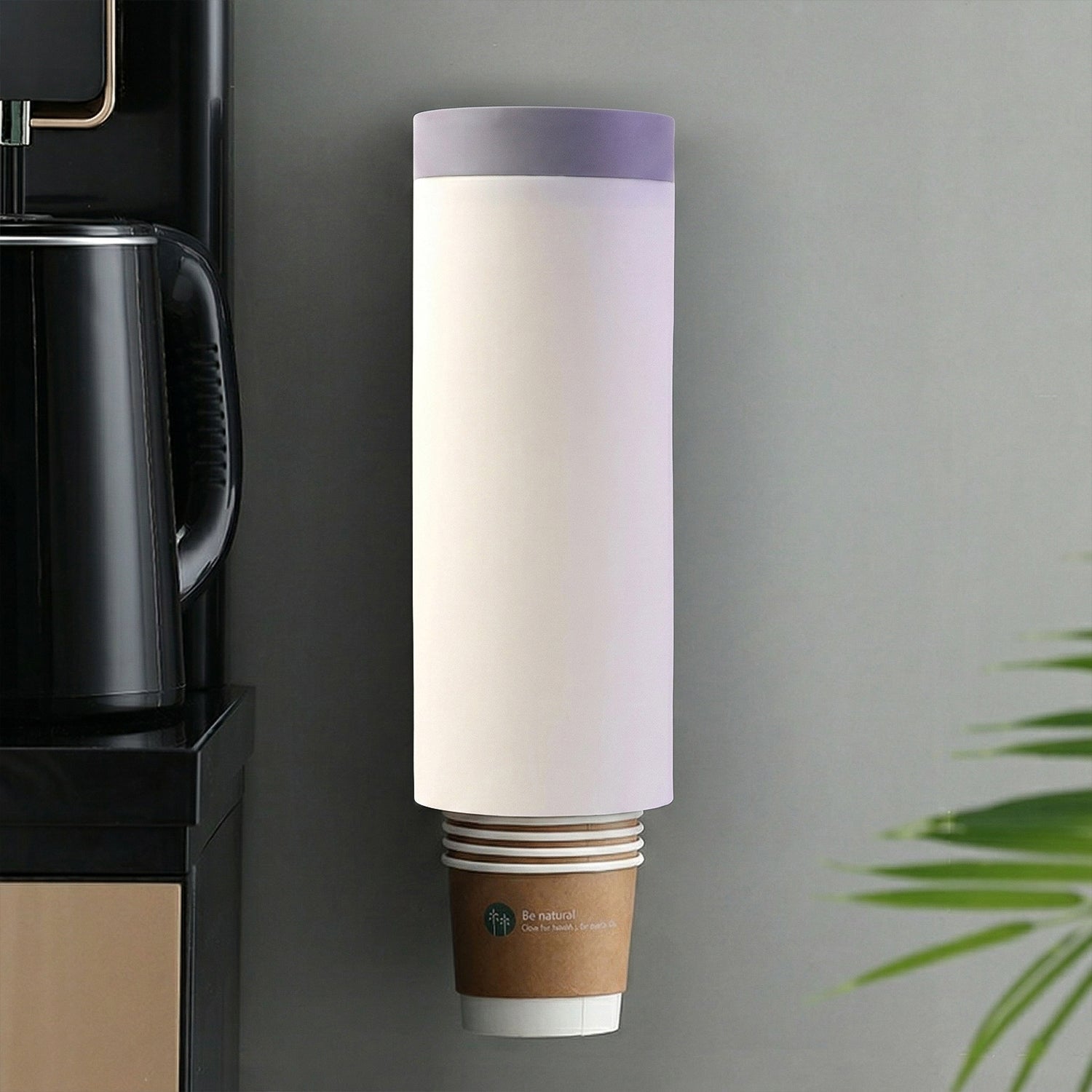Wall mounted paper cup holder with cups in cafe