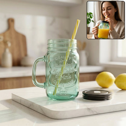 Clear glass Mason Jar with Handle and reusable BPA-free straw.