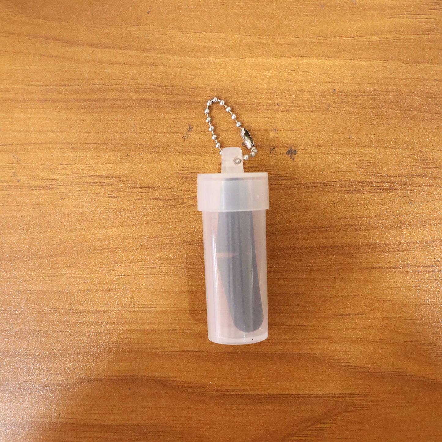 Person using soft noise reduction ear plugs for noise reduction