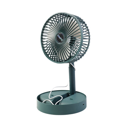 Close-up of compact foldable mini desk fan blades and mesh grille