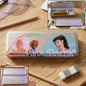 Printed metal pencil box with cartoon design and hinged lid