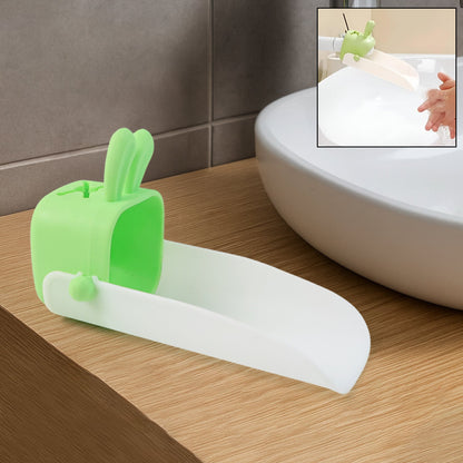Cute bear-shaped silicone kids faucet extender on a modern bathroom sink.