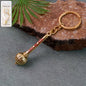 Jai Shree Ram keychain in golden metal with mace design front view