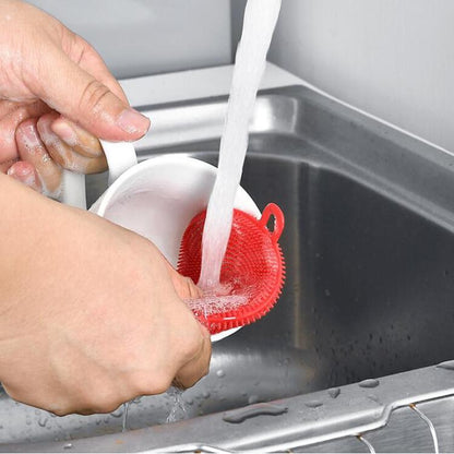 Close-up of a mildew-resistant silicone dish scrubber for hygienic cleaning.