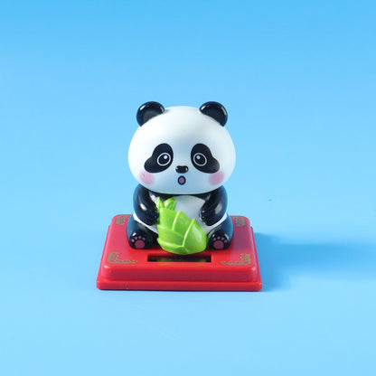 Solar energy powered panda decor with nodding head feature