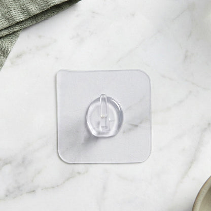 Hook attached on glass surface for versatile hanging