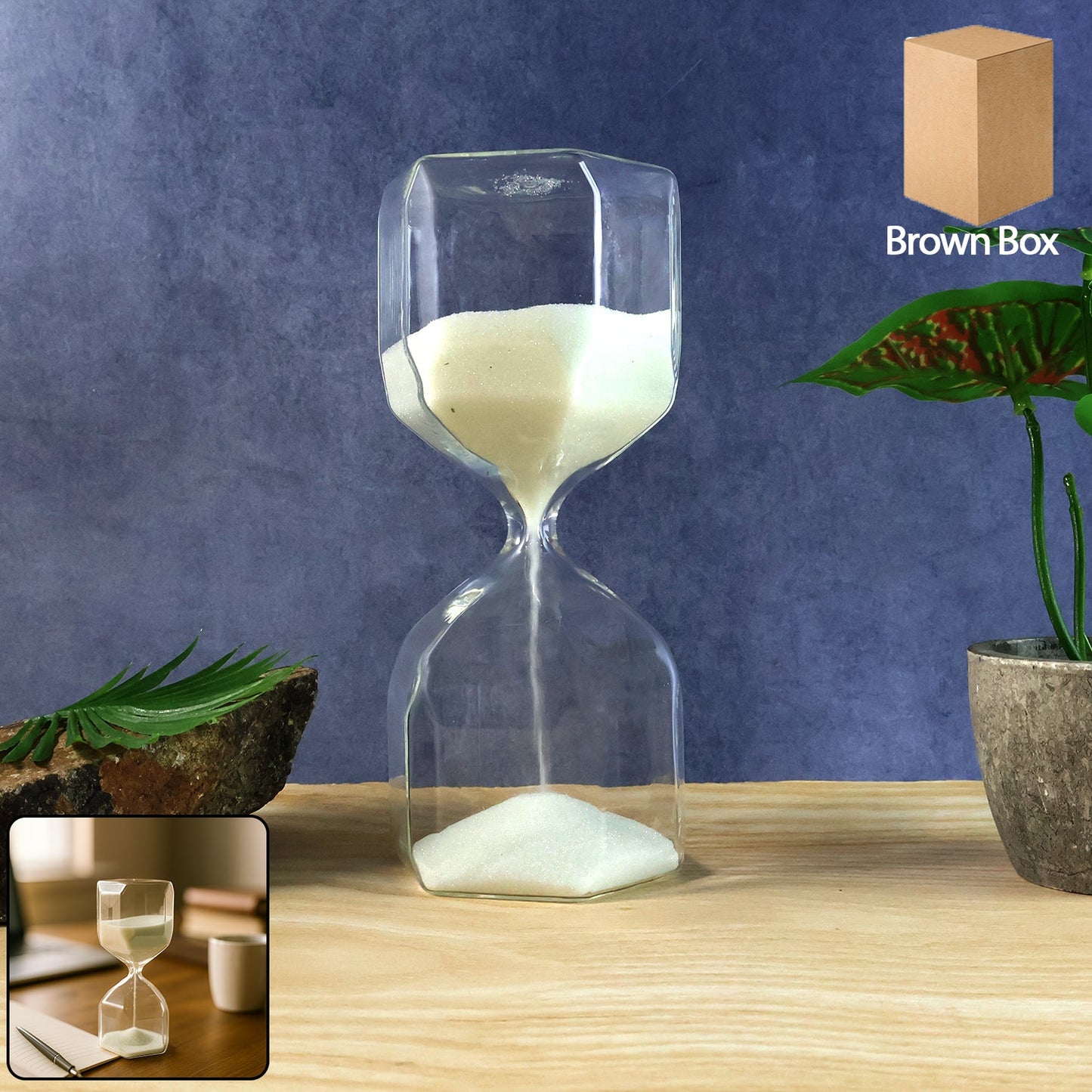 Clear glass hourglass timer with white sand showing elegant design for desk decor