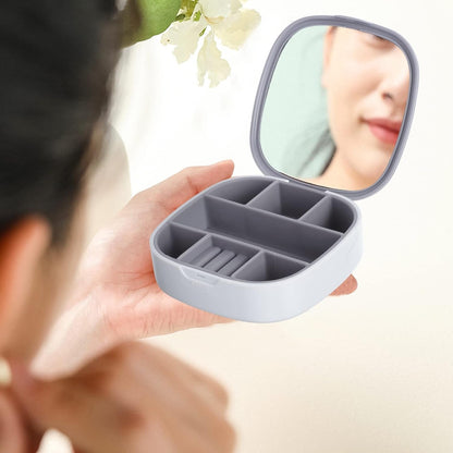 Jewelry organizer with compartments and secure closure