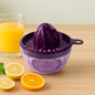 Manual citrus juicer with 650ml capacity made of durable plastic