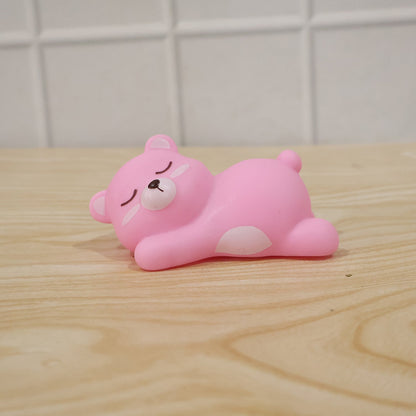 Rechargeable silicone sleeping bear lamp for children's room comfort.