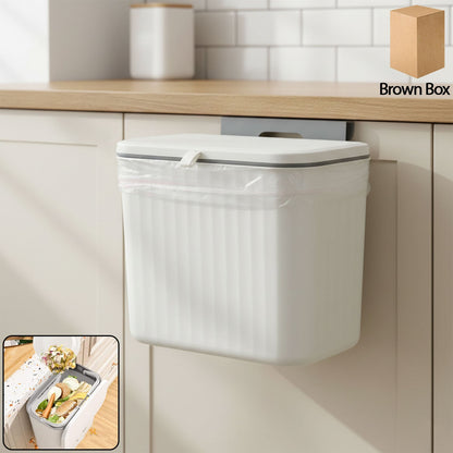 Wall mounted kitchen dustbin attached to cabinet door