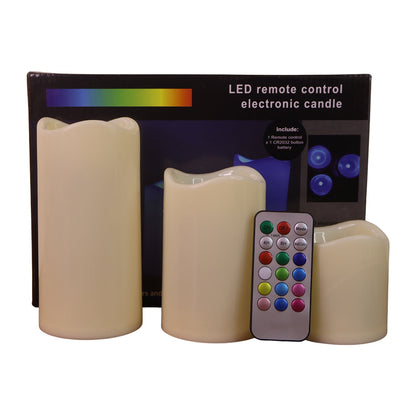 Three decorative LED flameless candles with remote control on display
