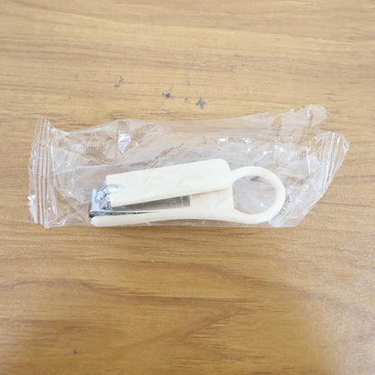 Ergonomic nail clipper showing smooth curved blades and anti-slip surface