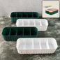 Four 5-compartment drawer organizers neatly stacked, storing socks and underwear.