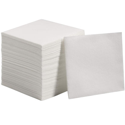 Hand gently touching a sheet of multicolor tissue paper to show its softness.