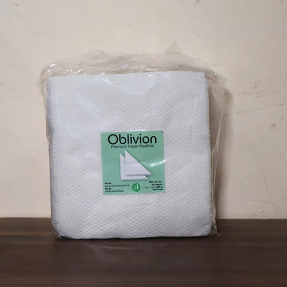 Multicolor tissue paper effectively cleaning a small spill on a kitchen surface.
