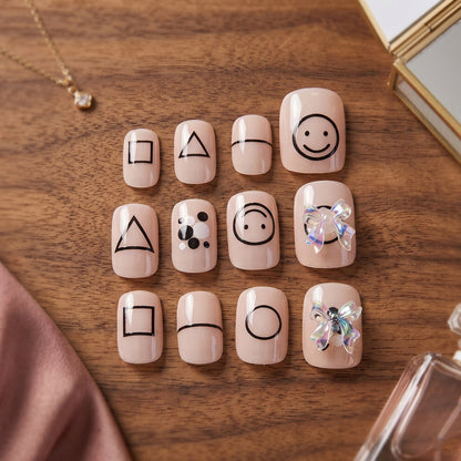 Stylish acrylic nail extensions on a hand, demonstrating a chic finish.