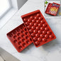Red plastic lollipop maker mold for homemade candies