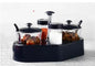 Full view of Ganesh Spice Condiment Set with transparent jar and colourful lid.