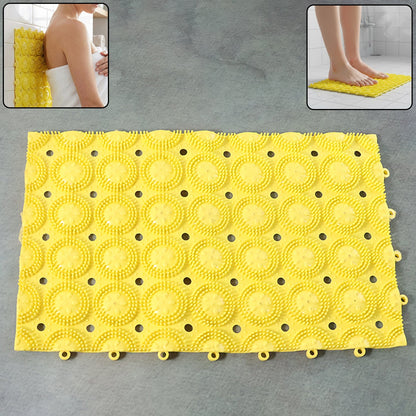 Close-up of suction cups beneath anti-slip bathroom massage mat
