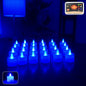 Blue LED tea light candles glowing softly in decorative arrangement