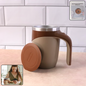 Sleek stainless steel self-stirring coffee mug from Mug Wala, perfect for any beverage.
