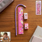 Pink kids stationery set with ruler, pencil, eraser, and sharpener for school.
