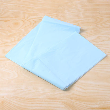 Disposable plastic table cover protecting table edges effectively